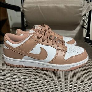 Women’s Nike Dunks. Size 9. Mauve/ rose gold color. Barely worn.